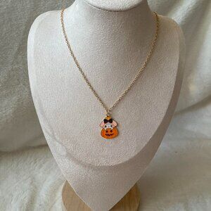 Halloween necklace with a gold chain, featuring a cute my melody wearing